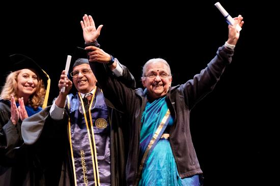 graduate brings mother onto the stage